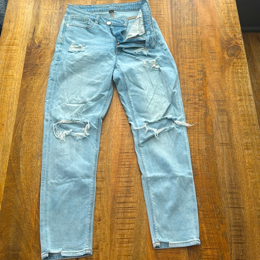 Light denim jeans, high rise mom jeans. Size 4